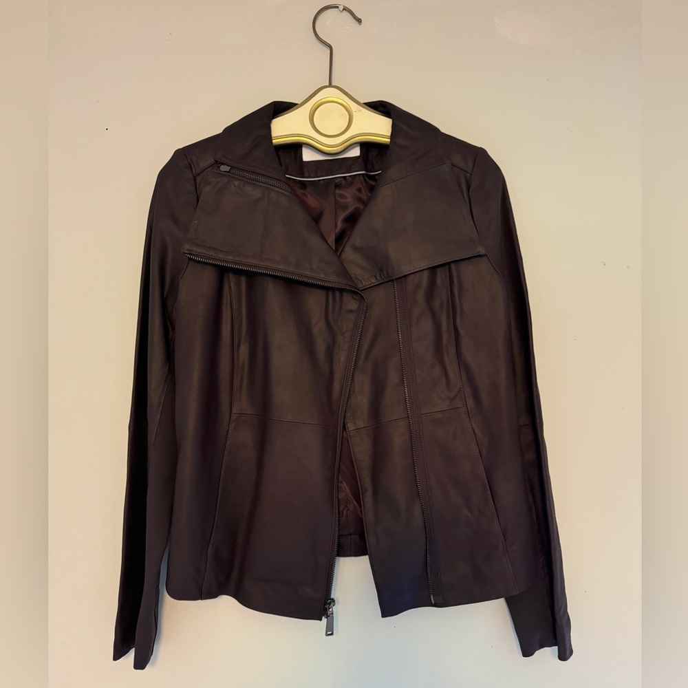 T Tahari dark purple leather jacket.